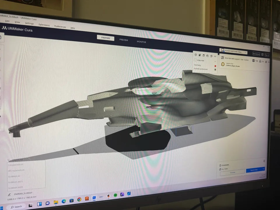 A digital Formula-inspired body displayed in 3D printing preparation software